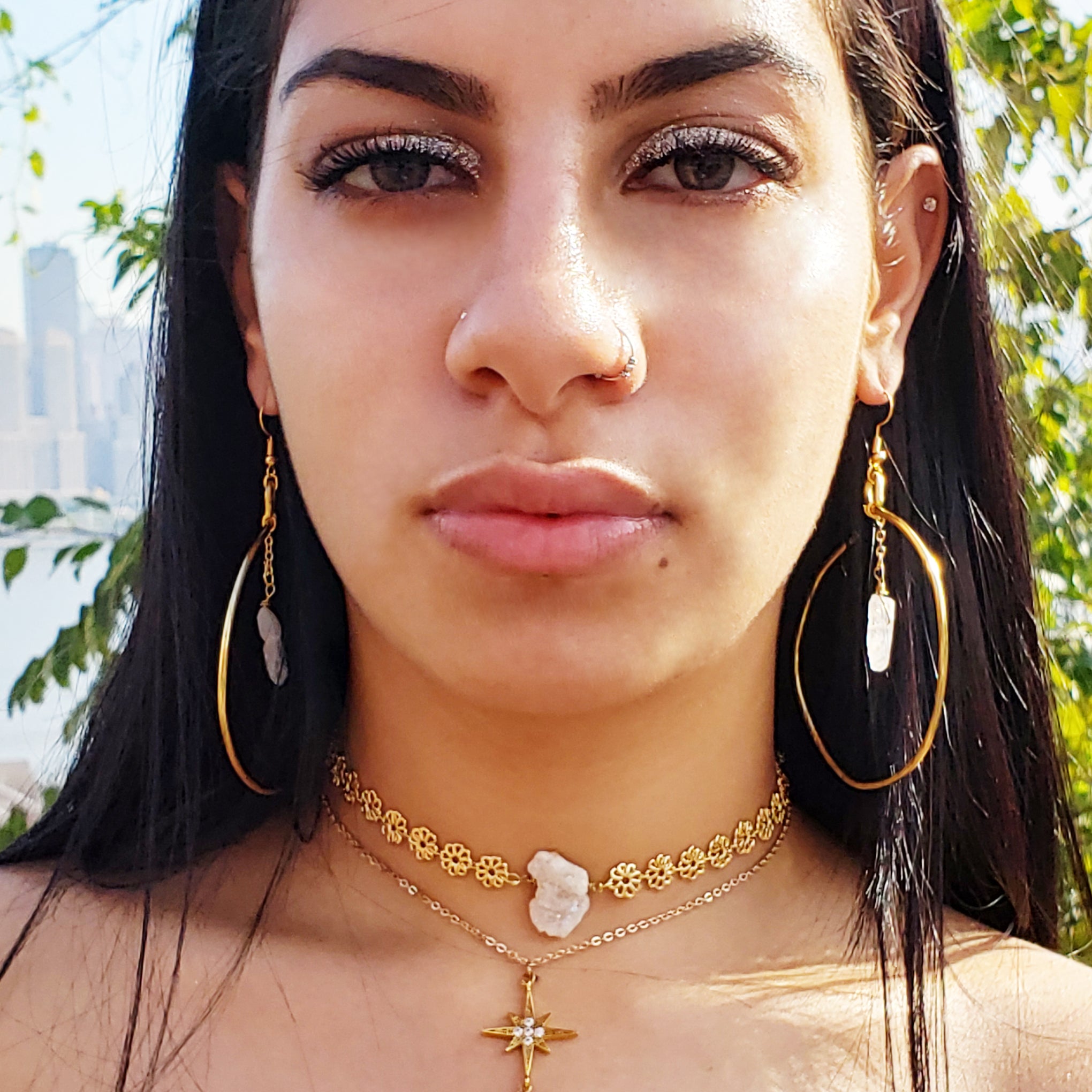 beautiful model wearing baddest bish ever butterfly vibe collection roccia d'oro fiore 16 karat gold white druzy crystal choker