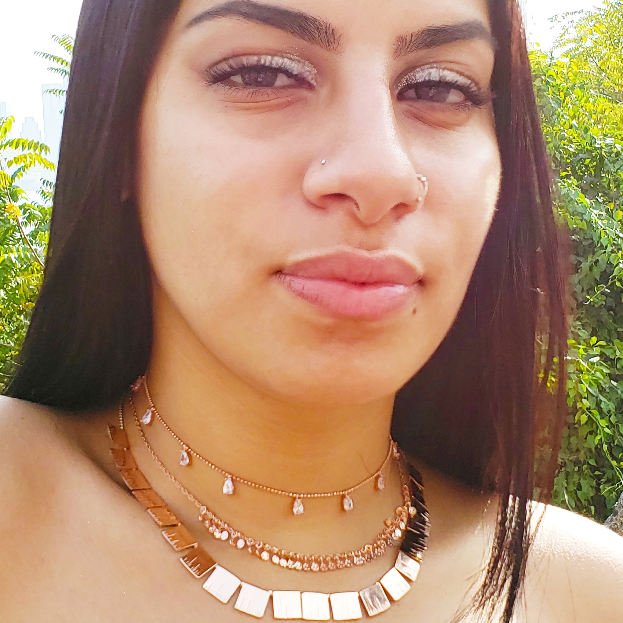 Baddest Bish Ever Fine Jewelry Enigmatic Ra Rose Gold Necklace in the Egyptian Royalty Collection beautiful model wearing