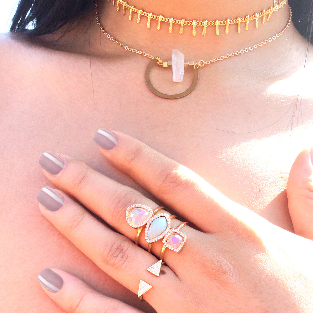 beautiful model wearing baddest bish ever fine jewelry Neptune Luvs Peony Glow Pink Chalcedony and Green Amazonite 18KT Gold Ring in Butterfly Vibe Collection
